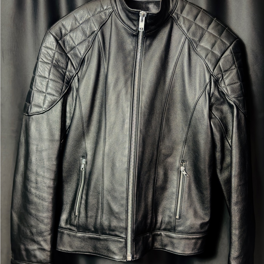Northbound black leather quilted/padded motorcycle jacket.